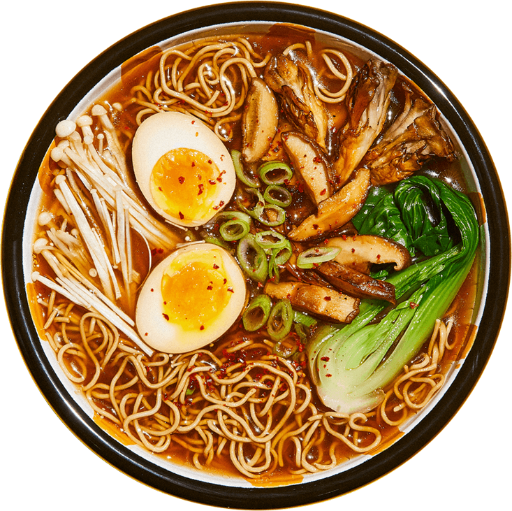 A healthy ramen with Bok choy, soft boiled egg, chives, mushrooms.